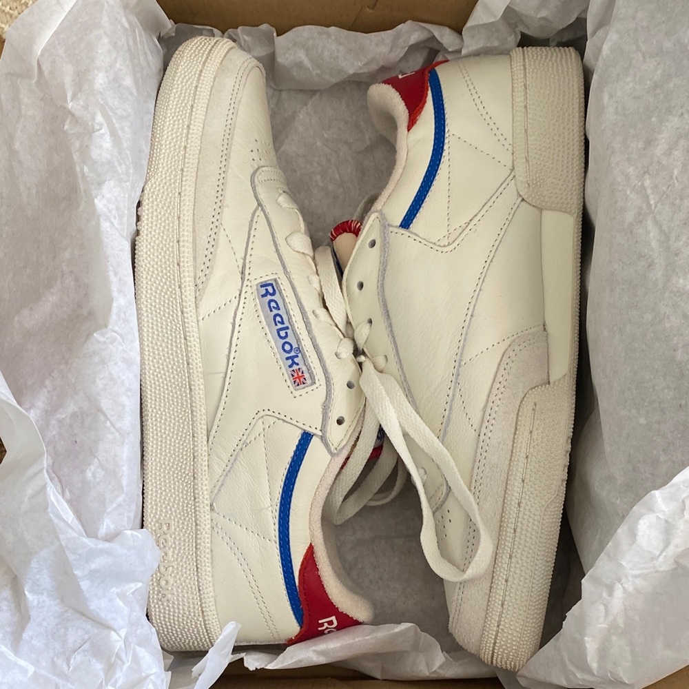 Madewell x Reebok collab unisex Cream Sneakers with Red and Blue Accents.